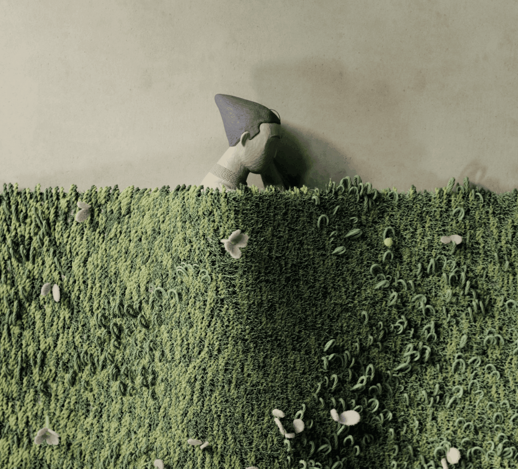 A character emerging from a green field of grass